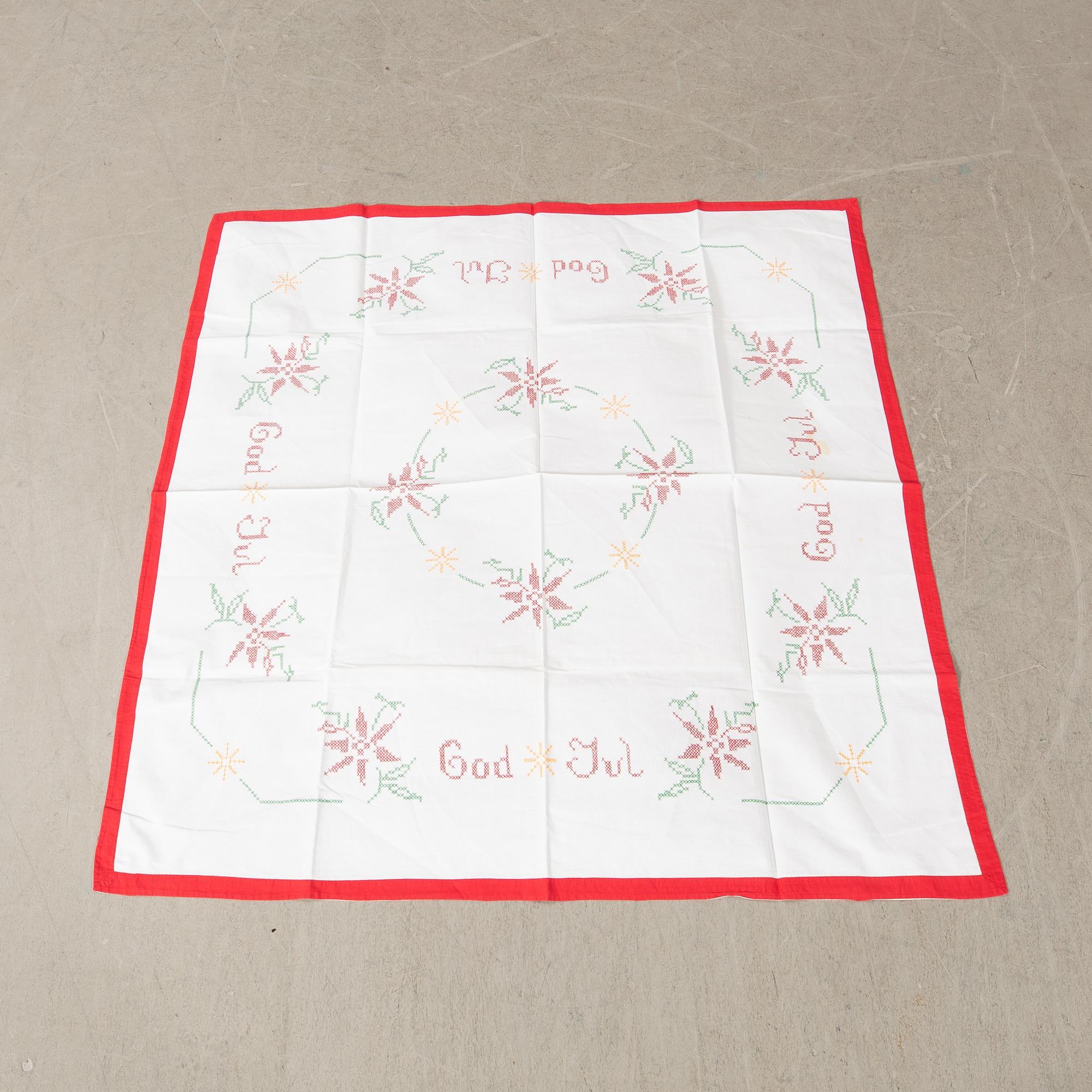 A collection of Christmas tablecloths 12 pcs first half/mid 20th century.