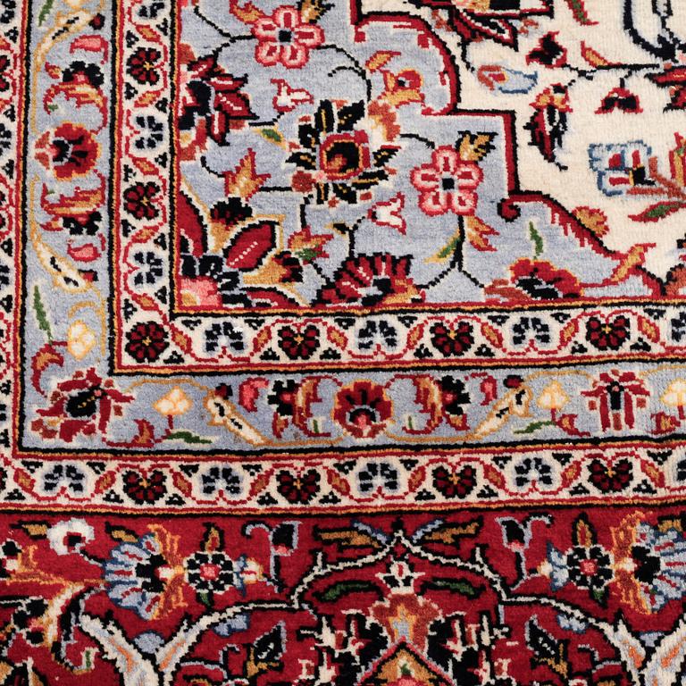 A Keshan rug, 402 x 302 cm.