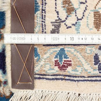 A Nain carpet, circa 310 x 196 cm.