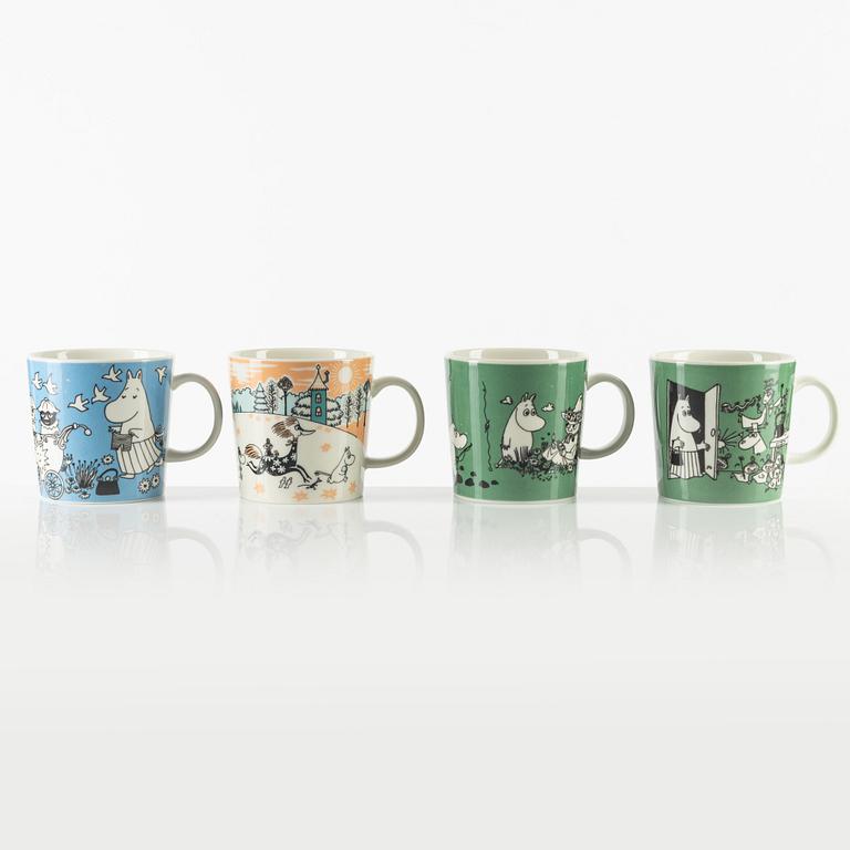 Four porcelain Moomin mugs, Arabia, Finland.