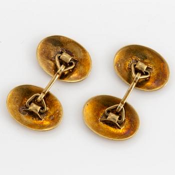 14K gold cufflinks.