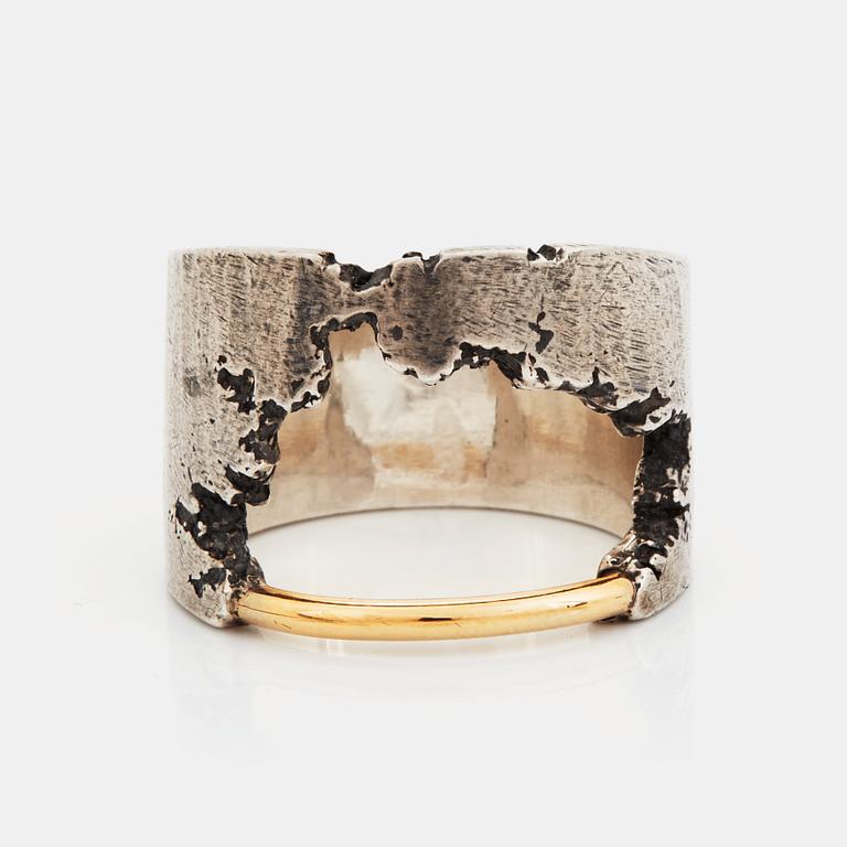 A Tobias Wistisen silver and gold ring.