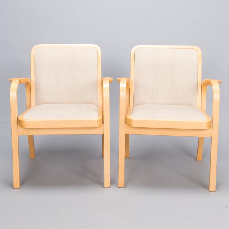 ALVAR AALTO, Pair of model 'E45' armchairs for Artek, late 20th Century.