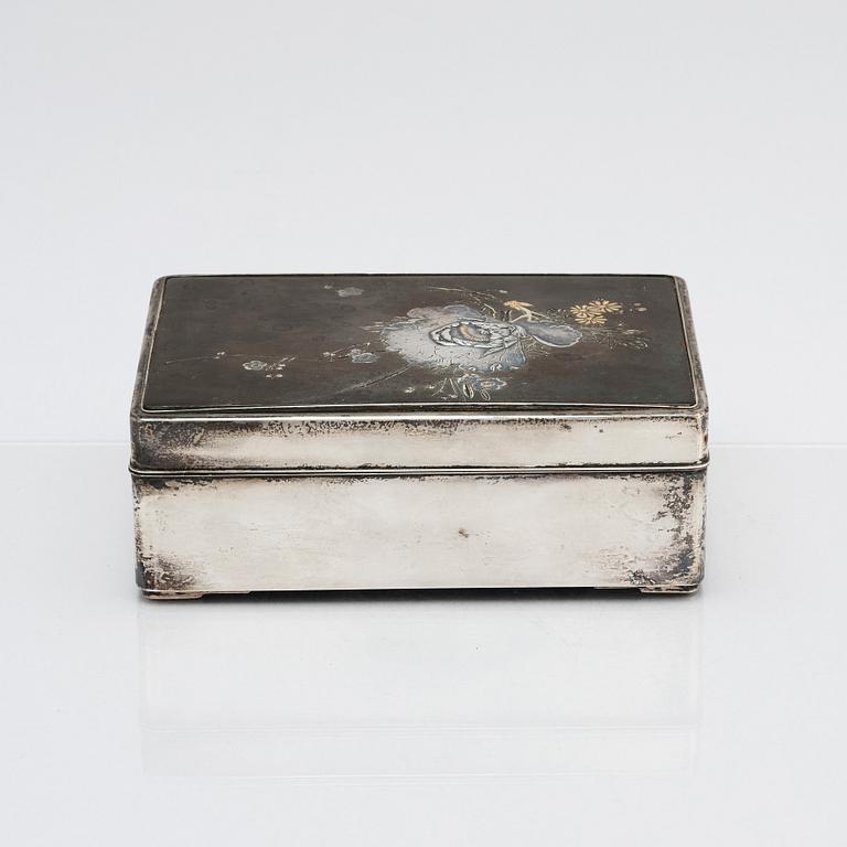 A Japanese silver box, early 20th century.