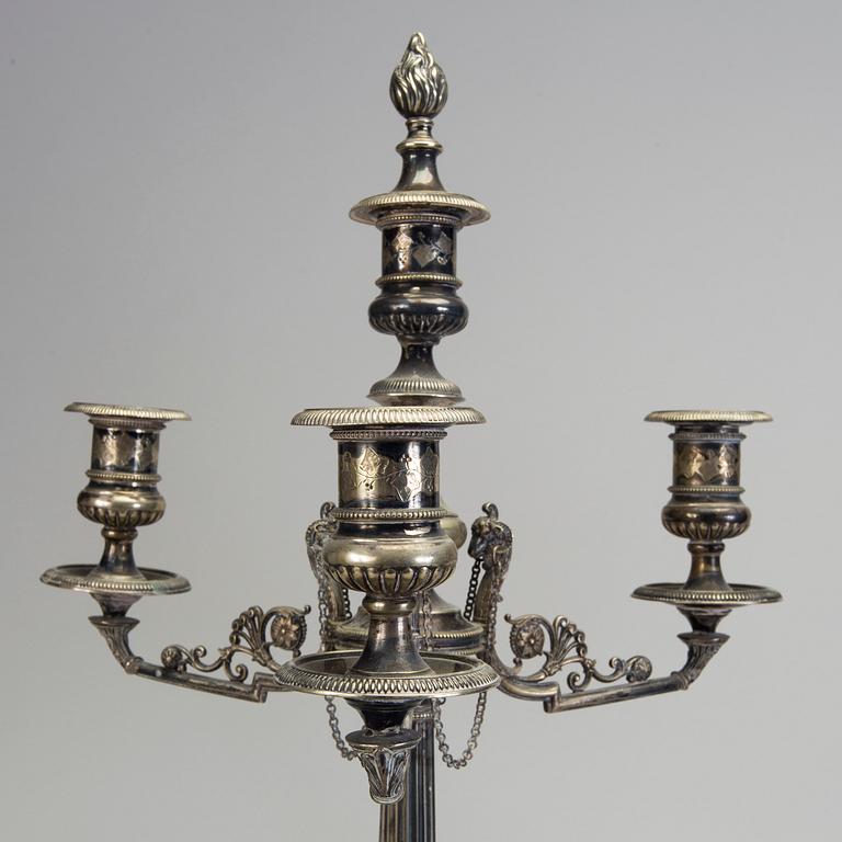 A pair of late 19th century silver plated kandelabras by Henry Wilkinson & Co Ltd, Sheffield, England.
