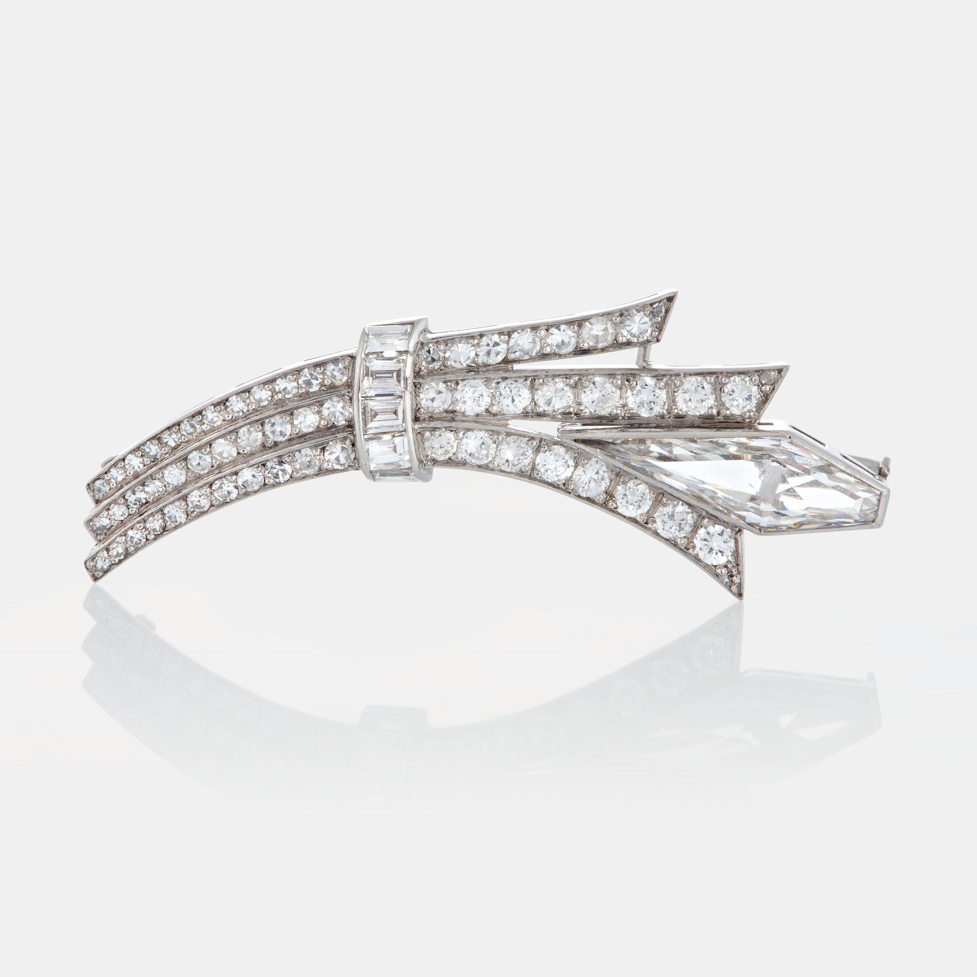 A WA Bolin brooch set with diamonds.