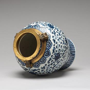 A blue and white bronze mounted vase, Qing dynasty, 18th Century.