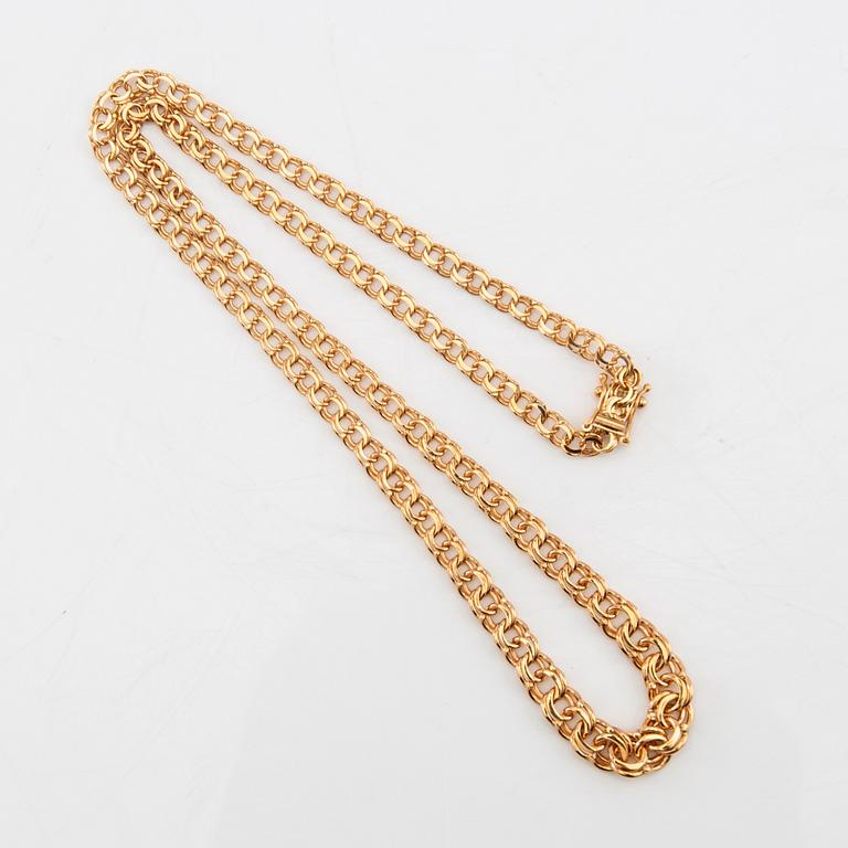 Necklace with a graduated Bismarck link in 18K gold.