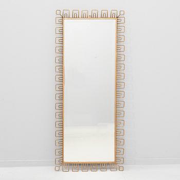 A 1940s Swedish Modern mirror.