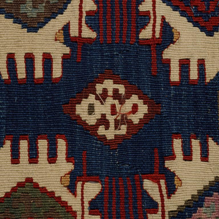 A carpet, a kilim, an antique Anatolian, ca 310-326 x 183,5-192 cm.