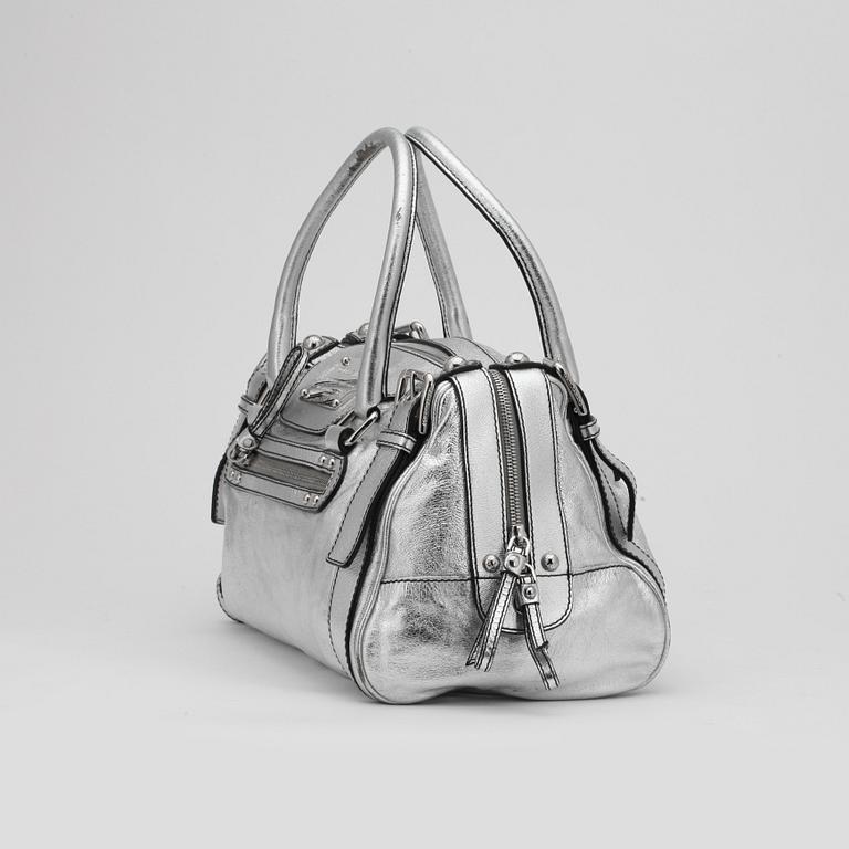 DOLCE & GABBANA, a silver colored leather shoulder bag, reportedly limited edition.