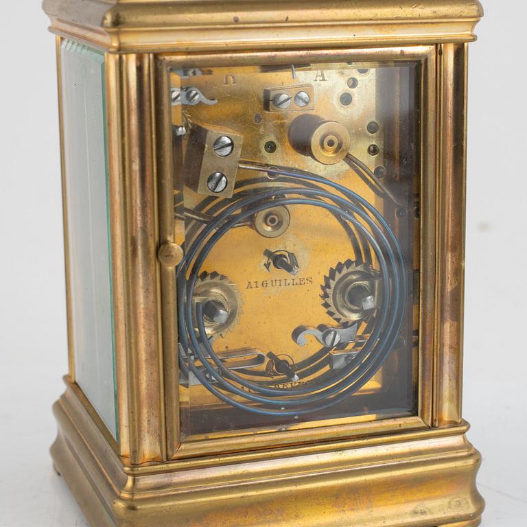 A brass carriage clock, first half of the 20th century.