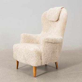 Carl Malmsten, armchair "Farmor", second half of the 20th century.
