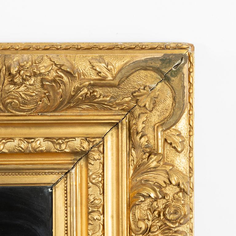 A picture frame, early 20th century, converted into a mirror.