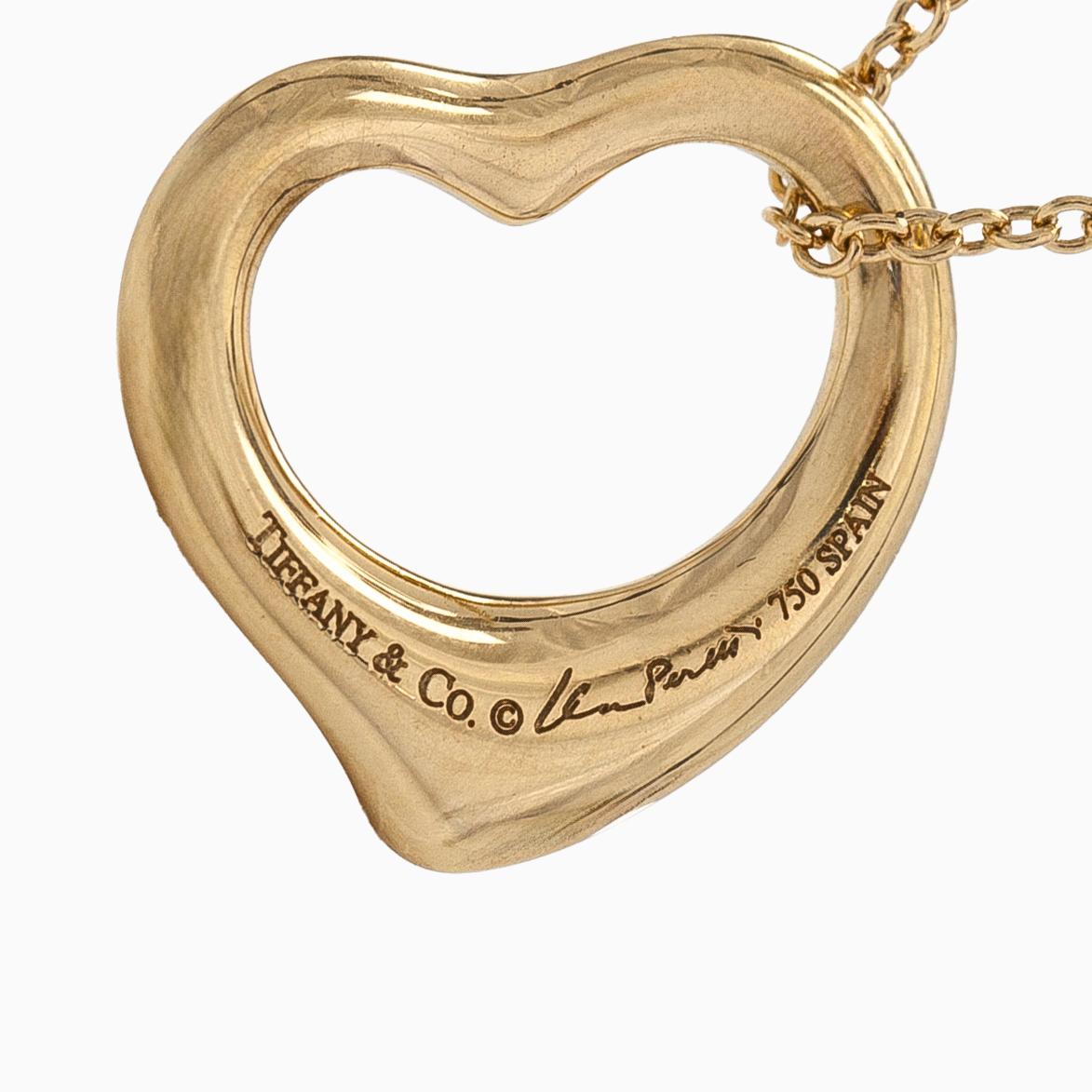 Tiffany & Co, Elsa Peretti, an 18K gold "Open Heart" necklace.