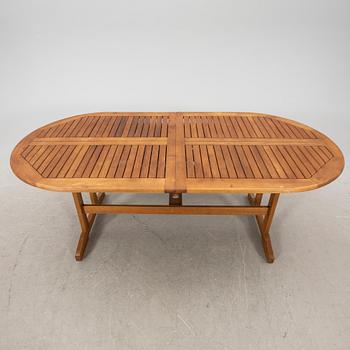 A 9 pcs stained teak garden suite by Brafab around 2000.