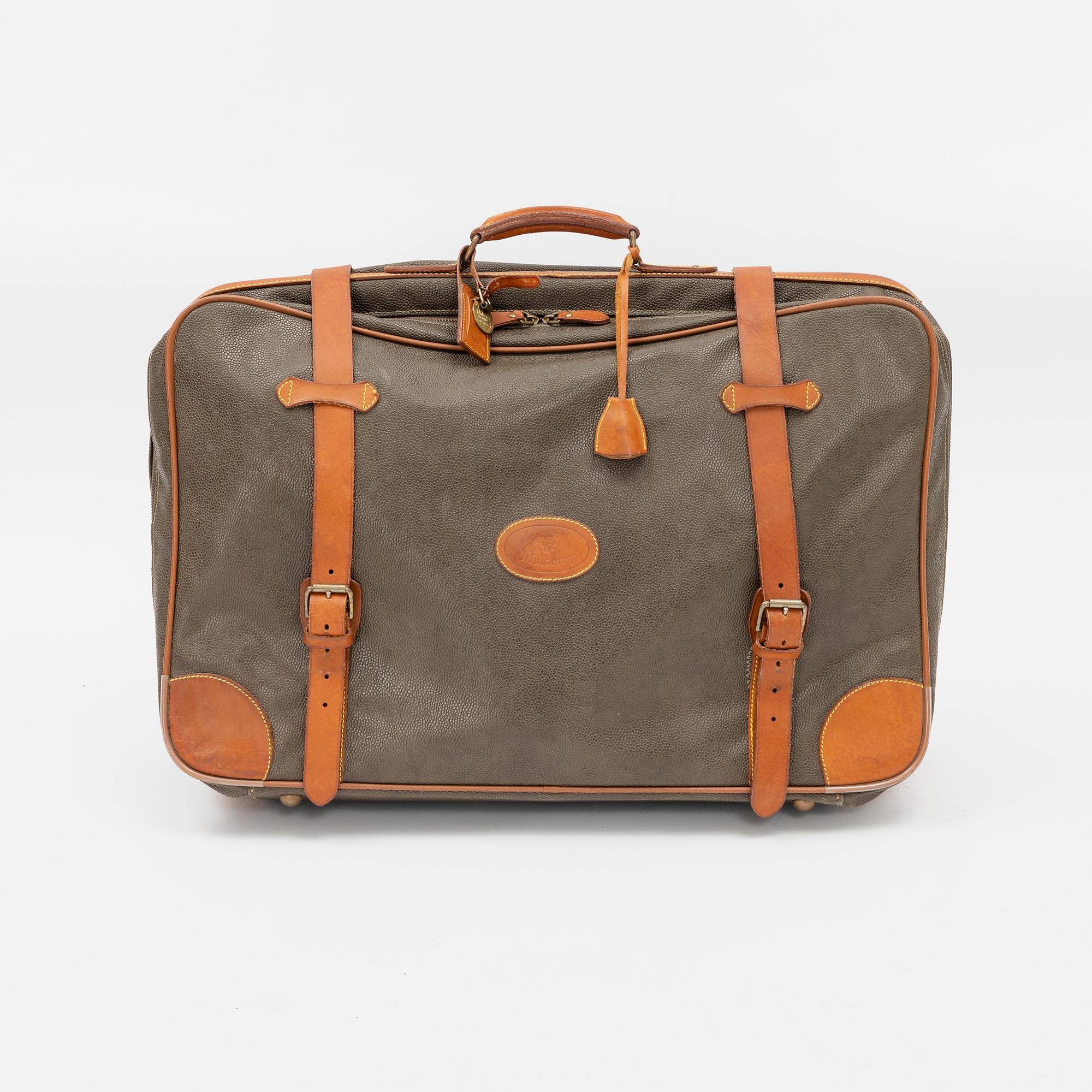 Mulberry, a scotch grain suitcase.