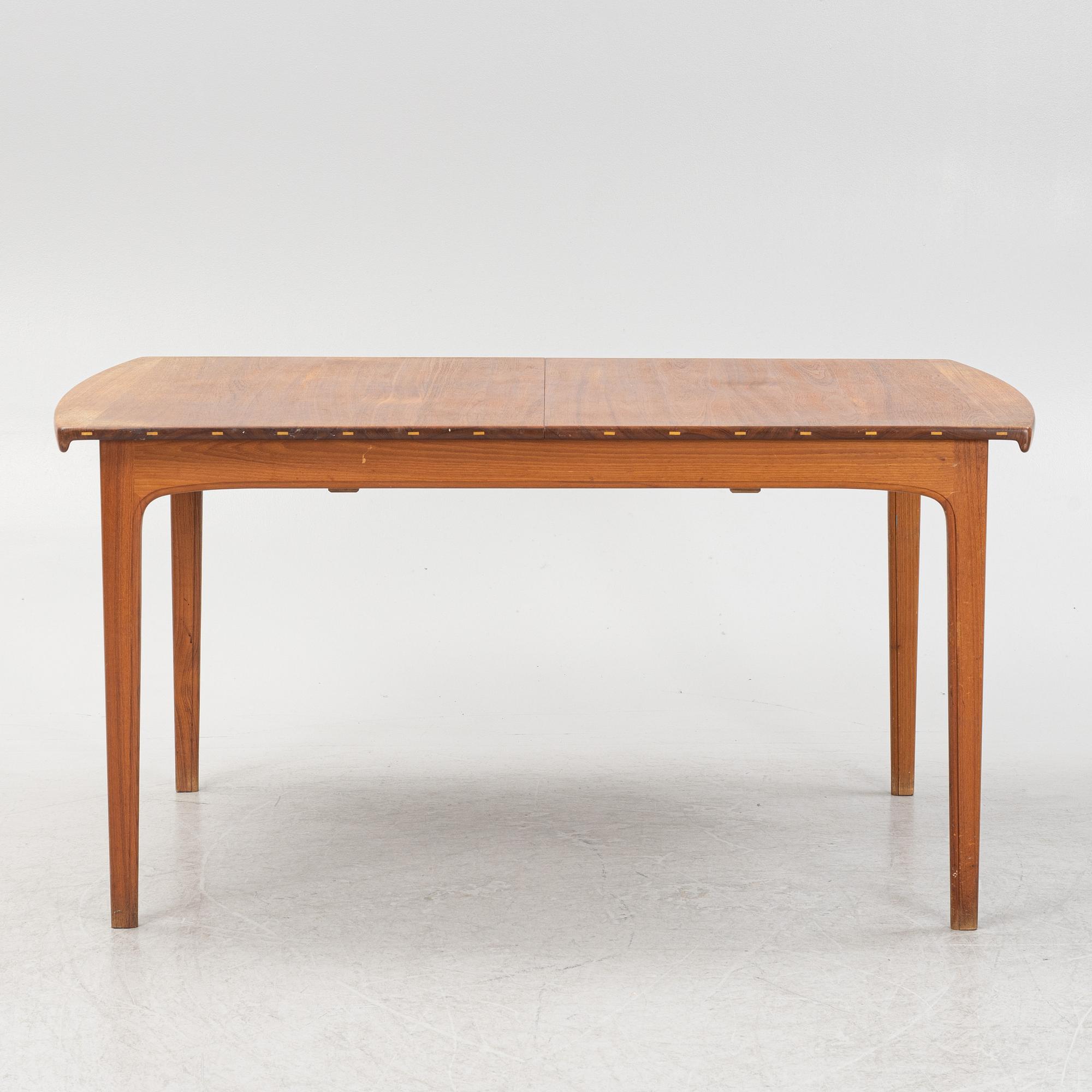 Yngvar Sandström, a teak-veneered dining table, Sweden, 1950's/60's.