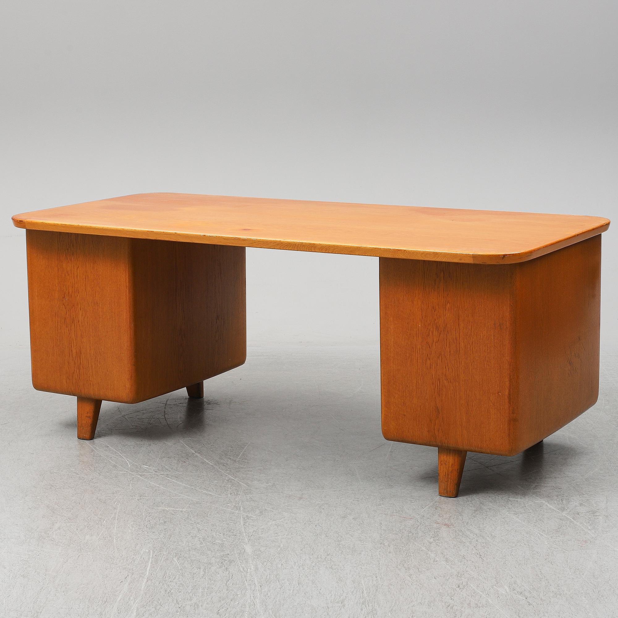 A 1950/60's oak writing desk.