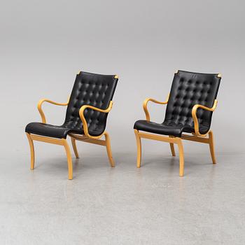 A pair of 'Mina' chairs designed by Bruno Mathsson, Bruno Mathsson International, Värnamo, Sweden.
