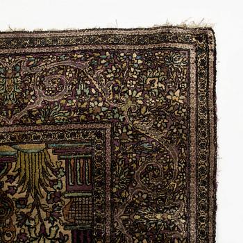 An antique silk Feraghan carpet, c. 195 x 121 cm.