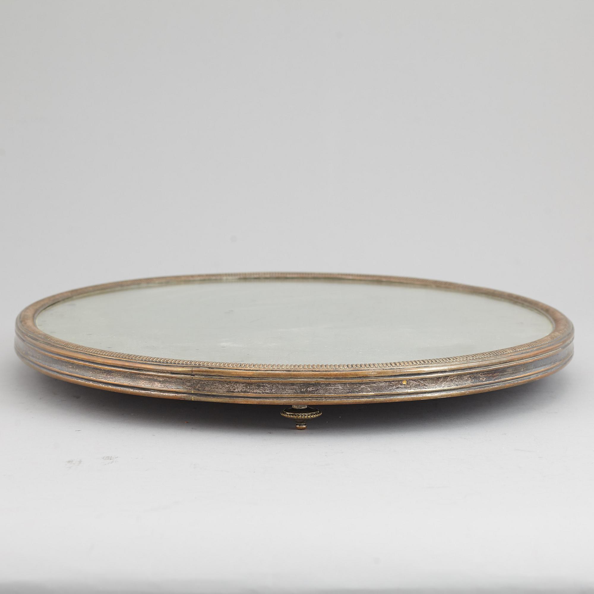 A argent hache table top, England, circa 1900.