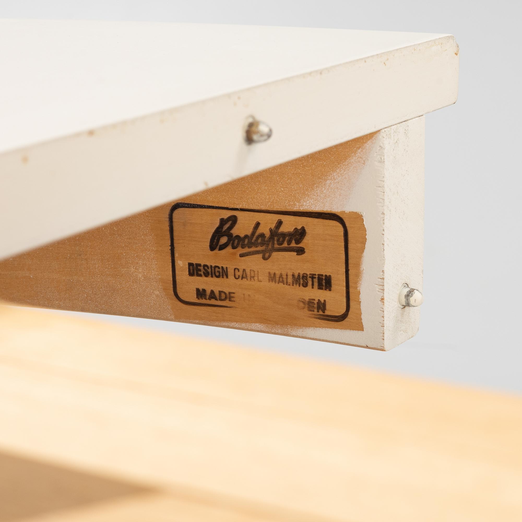 Carl Malmsten, a 'Herrgården' dining table and four 'Ulfåsa' chairs, second half of the 20th Century.