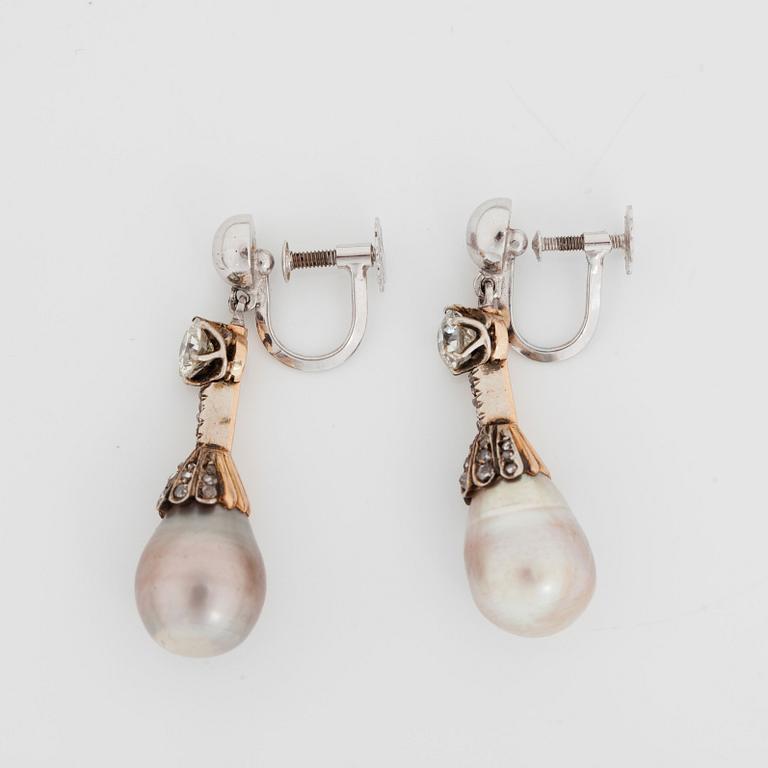 A pair of natural saltwater pearl and diamond earrings. Certificate from the Gem and Pearl Laboratory.