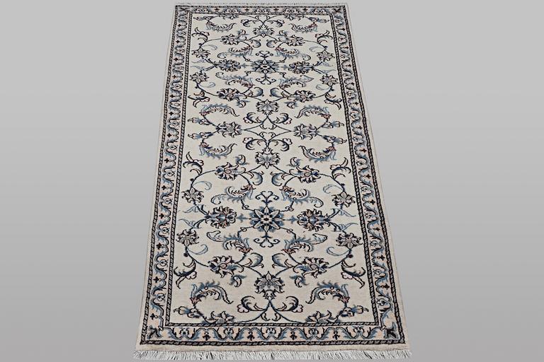 A runner carpet, Nain, part silk, ca 192 x 80 cm.