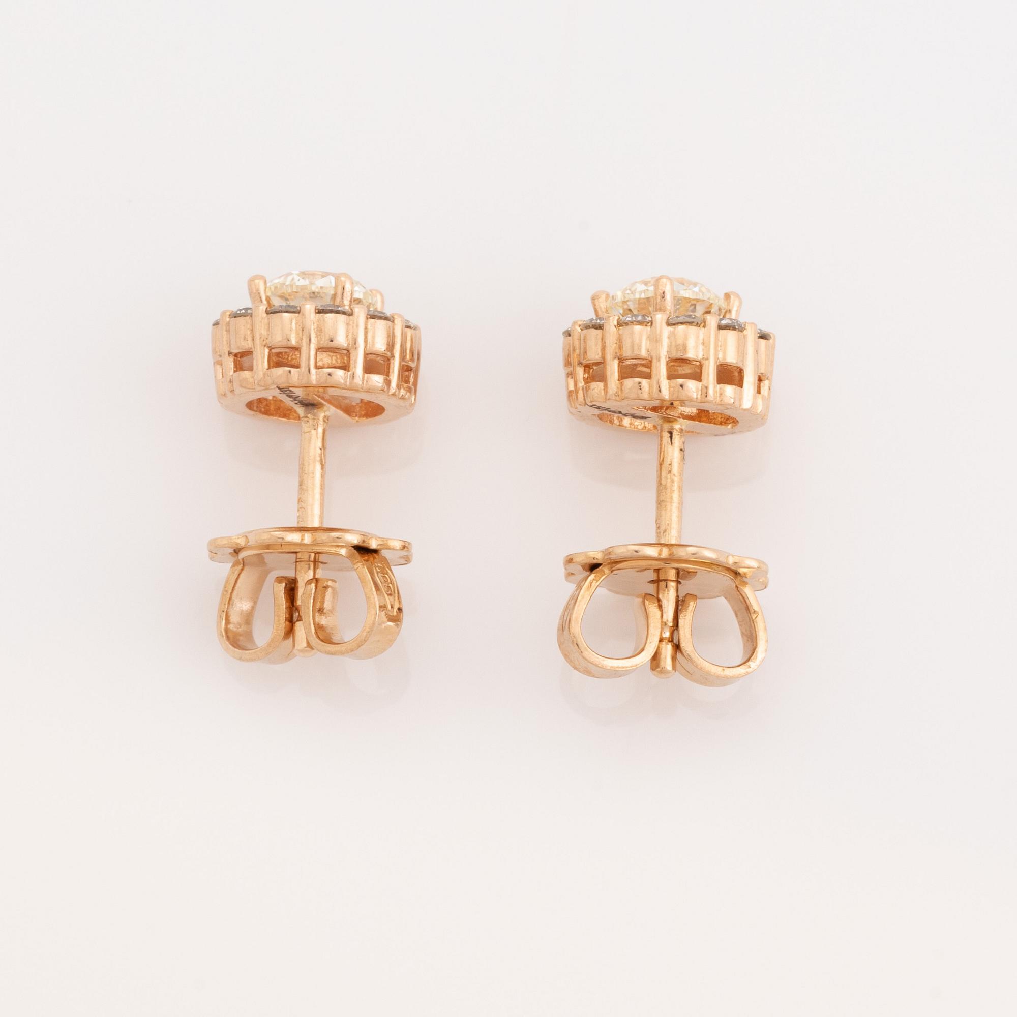 Brilliant cut diamond earrings.