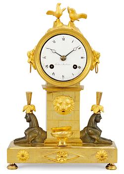 1071. A Swedish Empire mantel clock by C. A. Talén.