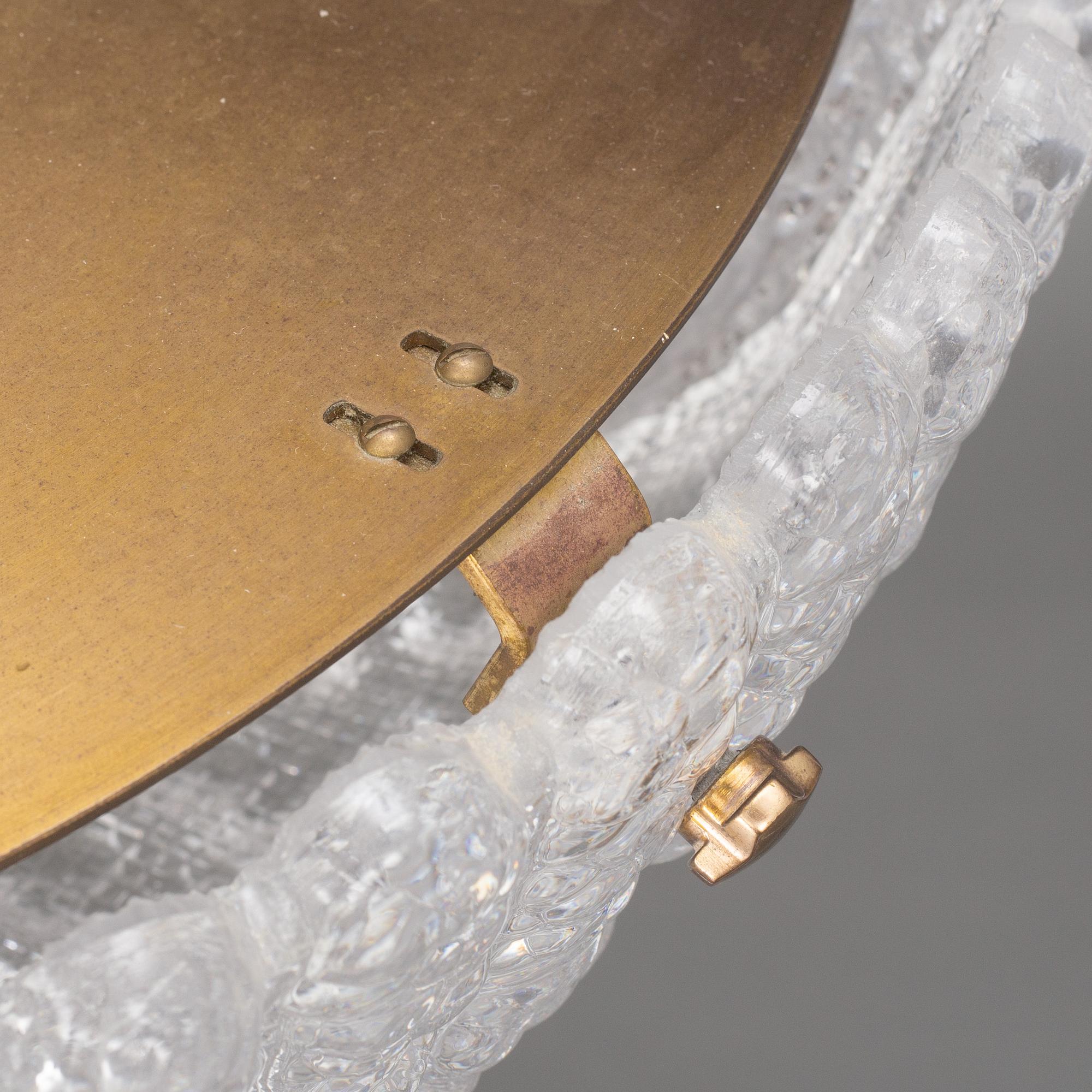 Carl Fagerlund, a brass and glass ceiling lamp, Orrefors, late 20th century.
