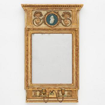 A late Gustavian two-branch girandole mirror, Stockholm, late 18th century.