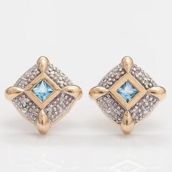 A set of 14K gold earrings and pendant with topazes and diamonds ca. 0.04 ct.