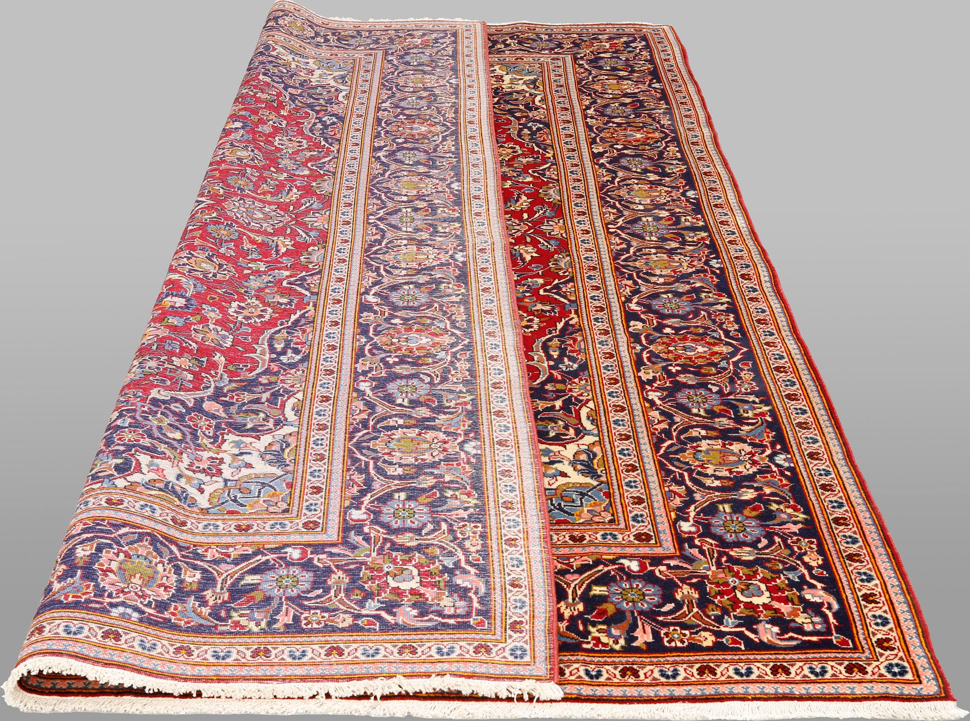 A Keshan rug, approx. 305 x 194 cm.