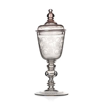 303. A large cut and engraved glass goblet with cover, 18th Century.