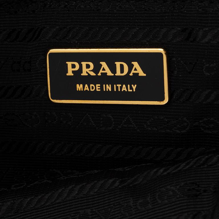 Prada, a black nylon bag.