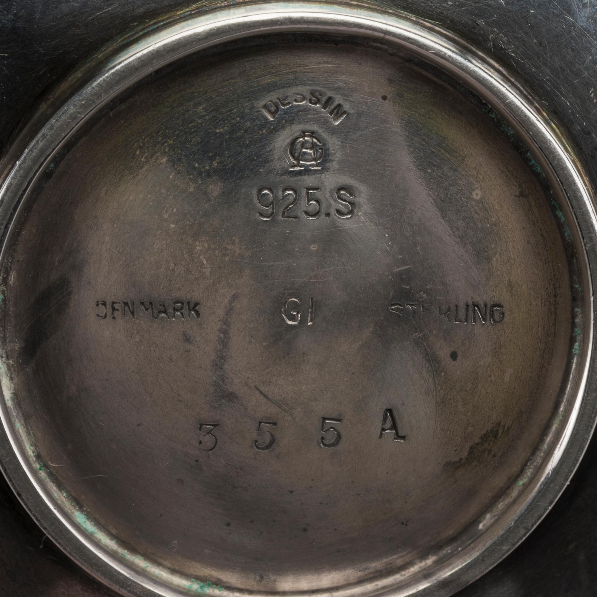 A Danish 20th century sterling set of six ashtrays, mark of G Jensen Copenhagen first half of the 19th century.