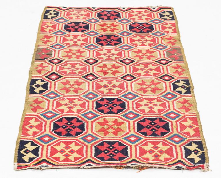 A carrige cushion,flat weave, ca 94,5 x 43 cm, Skåne, 1800-1830.