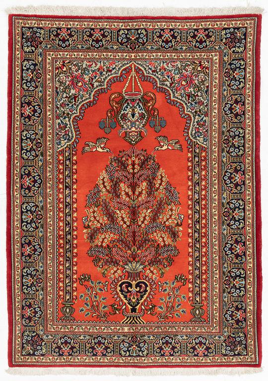 A Quum rug, ca 152 x 106 cm.