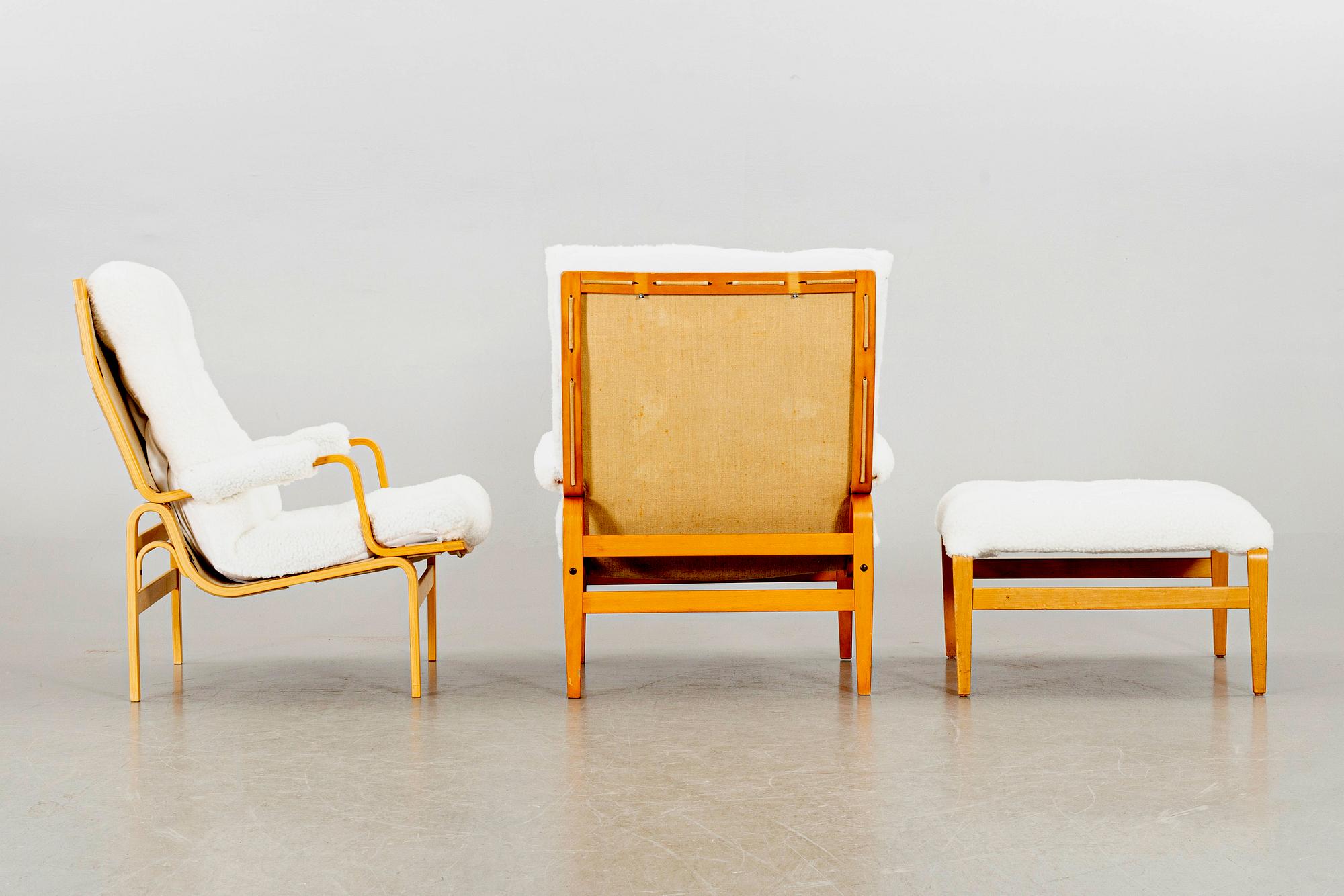 BRUNO MATHSSON, a pair of Ingrid armchairs for DUX later part of the 20th century.