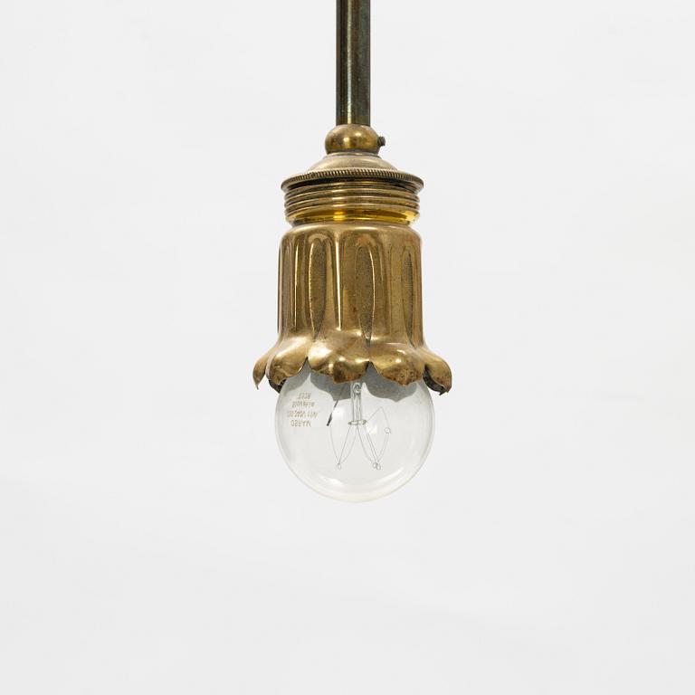 An Art Nouveau brass and glass table light, early 20th Century.