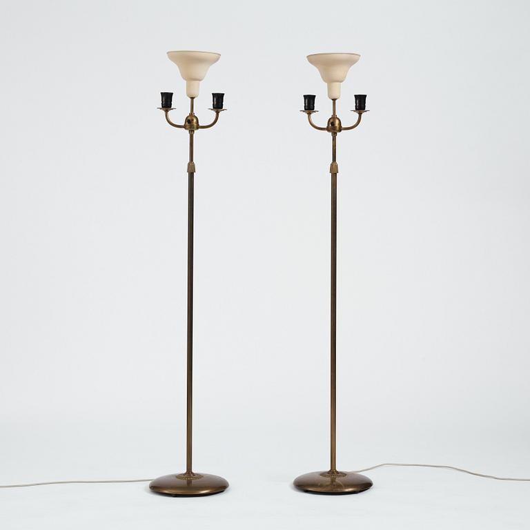 Nordiska Kompaniet, a pair of Swedish Grace floor lamps, 1930's.
