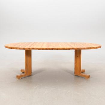 A pine dining table, 1970s.