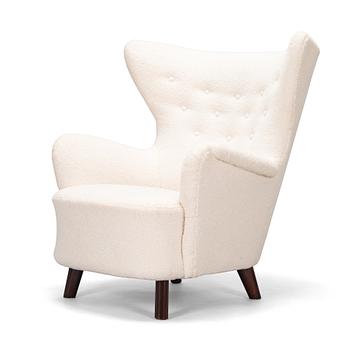 A mid-20th-century armchair.