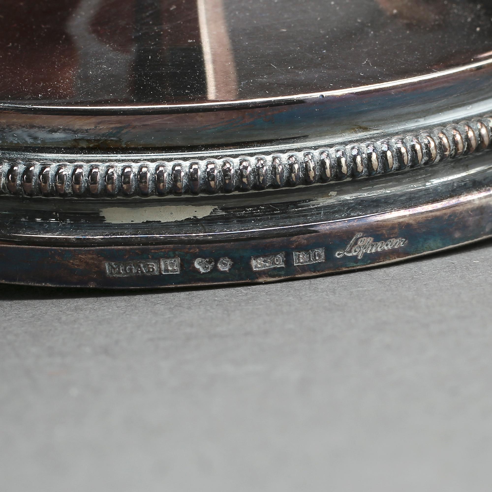 LJUSSTAKAR, ett par, silver, Eric Löfman för KG Markström, Uppsala, 1976.