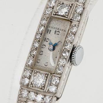 Platinum and brilliant-cut diamond art déco ladies watch.