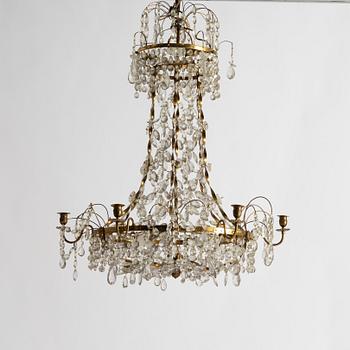 A late Gustavian gilt brass and cut glass seven-light chandelier, Stockholm, late 18th century.