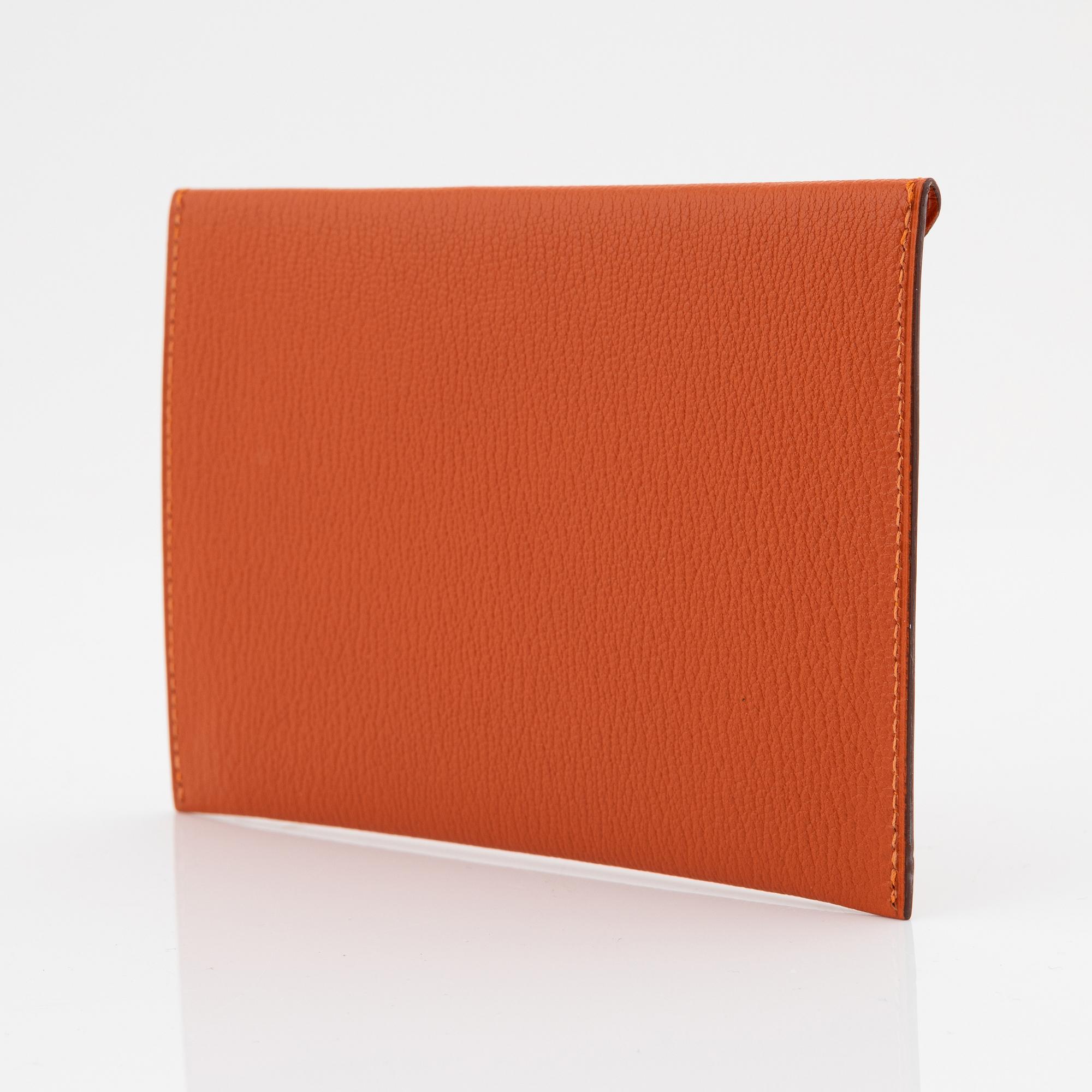 Hermès, A orange leather 'Envelope pouch', 2003.