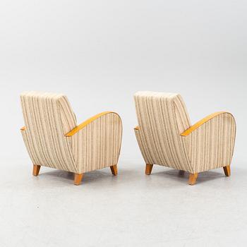 A pair of Swedish Modern easy chairs, Dux T-serie, 1940's/50's.